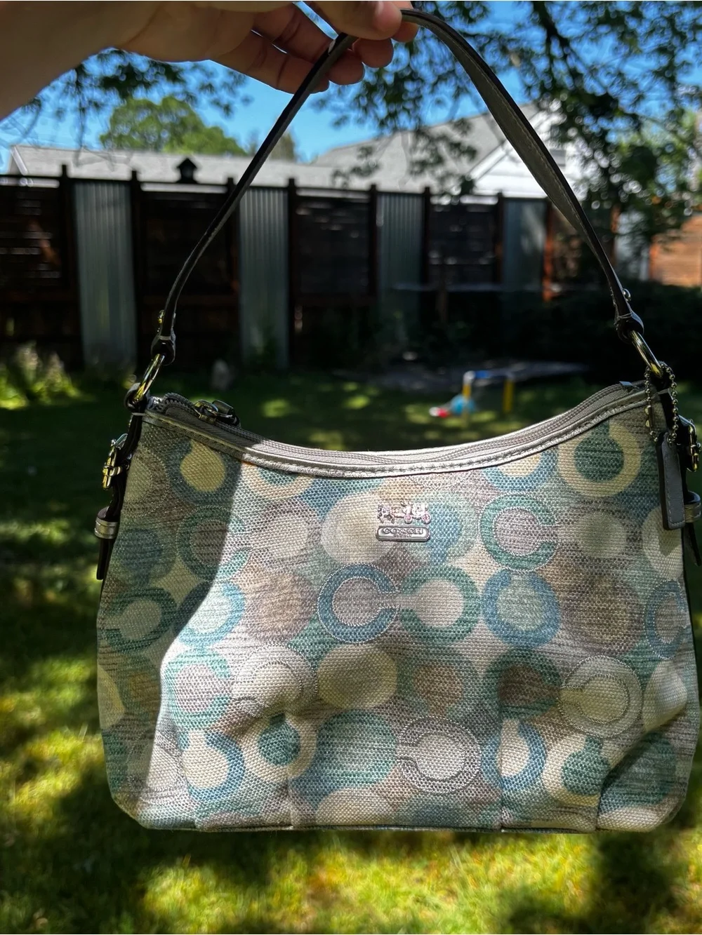 Coach baguette shoulder bag featuring a multicolored 